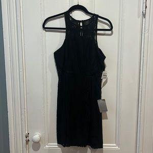 NSR black lace dress size M. New with tags